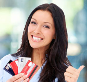 Financially savvy woman holding credit cards