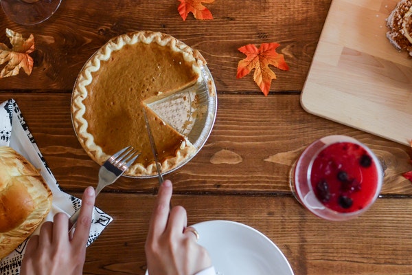 Avoid more debt by hosting Thanksgiving on a budget.