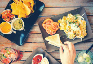 Use our tips to stay on budget when eating out. 