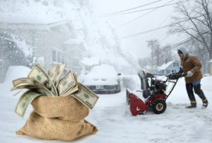 A man cleaning snow and winter weather expenses