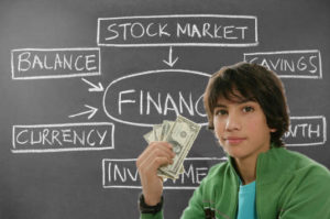 Teenage boy holding money