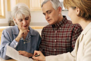 Older couple reading their financial statement