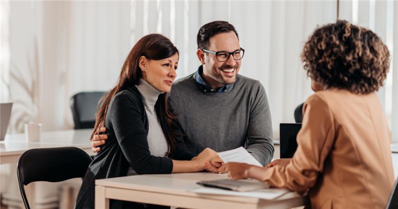 a couple listening to a counselor