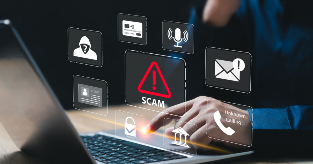 a computer screen with word scam and a red warning sign